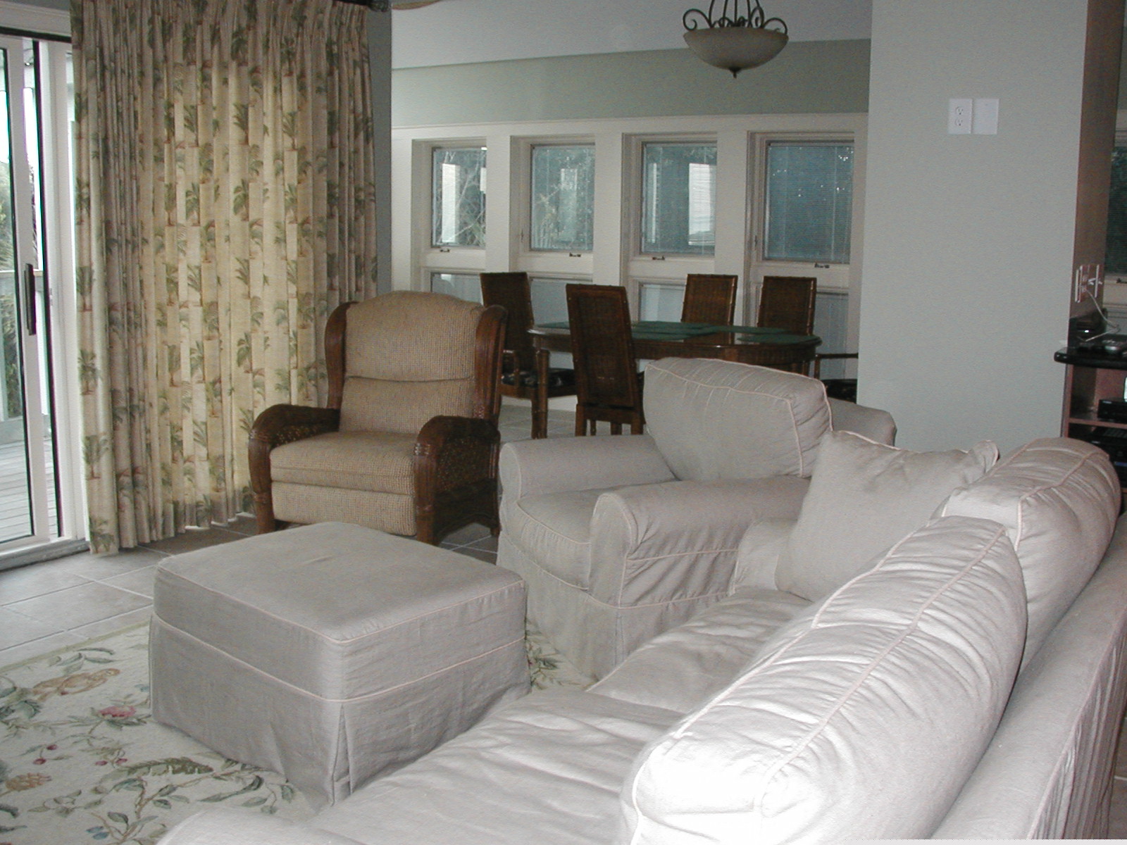 family room/dining/sitting area which over looks the ocean and deck.